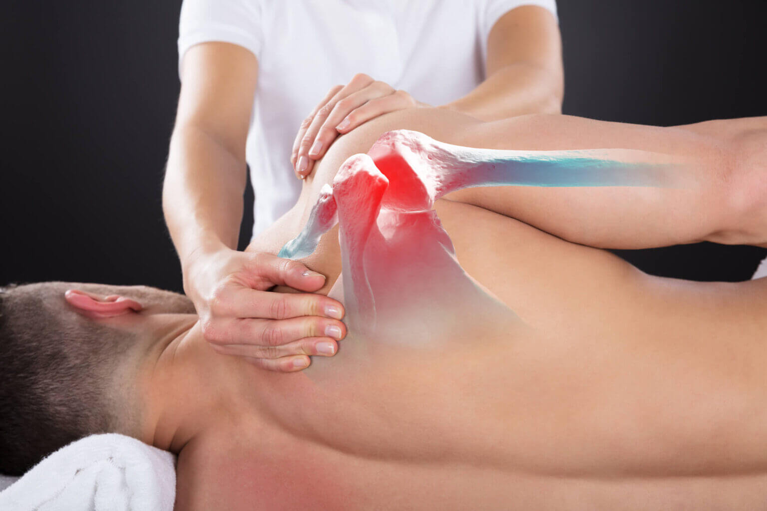 Cross-fit and weightlifting massage of massage therapist massaging shoulder. 